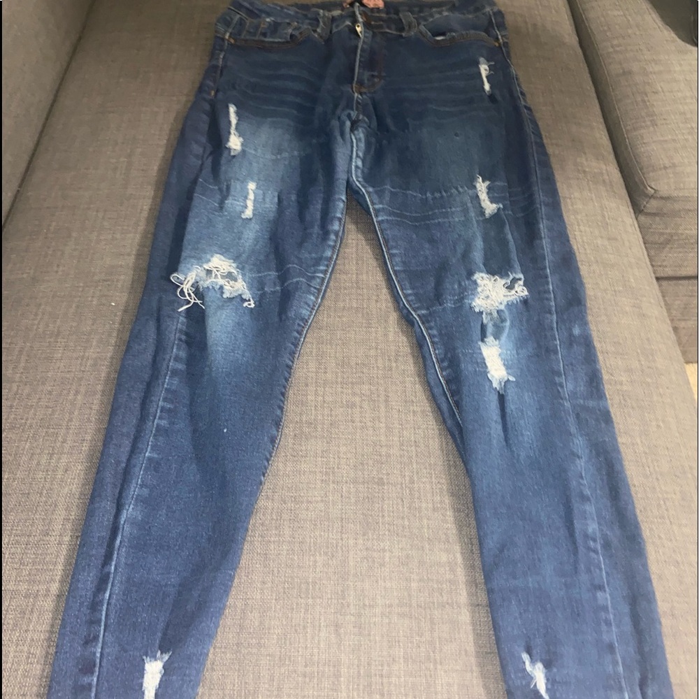 Ripped blue jeans